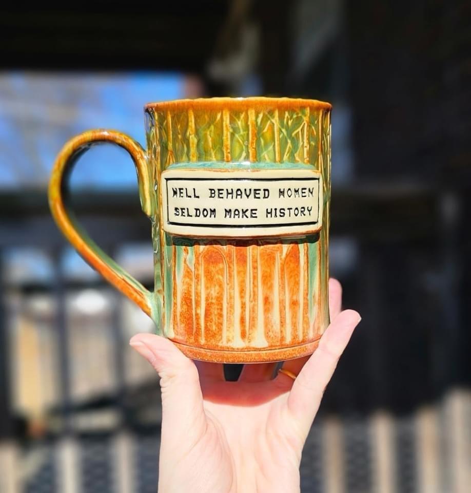 Orange striped mug by Heather DeJack