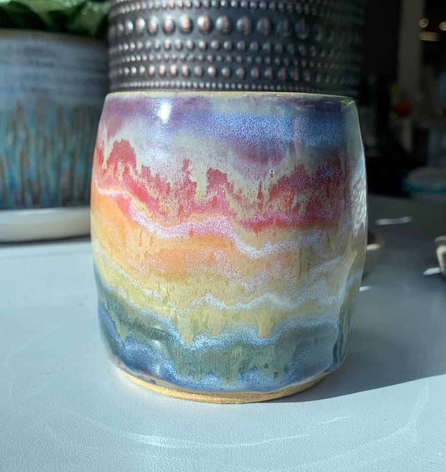 Drippy rainbow mug by Joanne Vukman