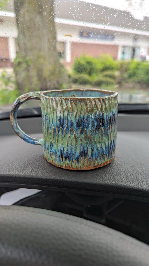 Blue-green carved mug by Ally Brogan