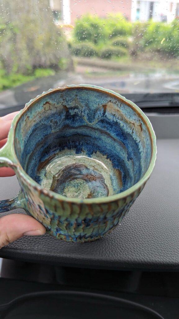 Blue-green carved mug by Ally Brogan