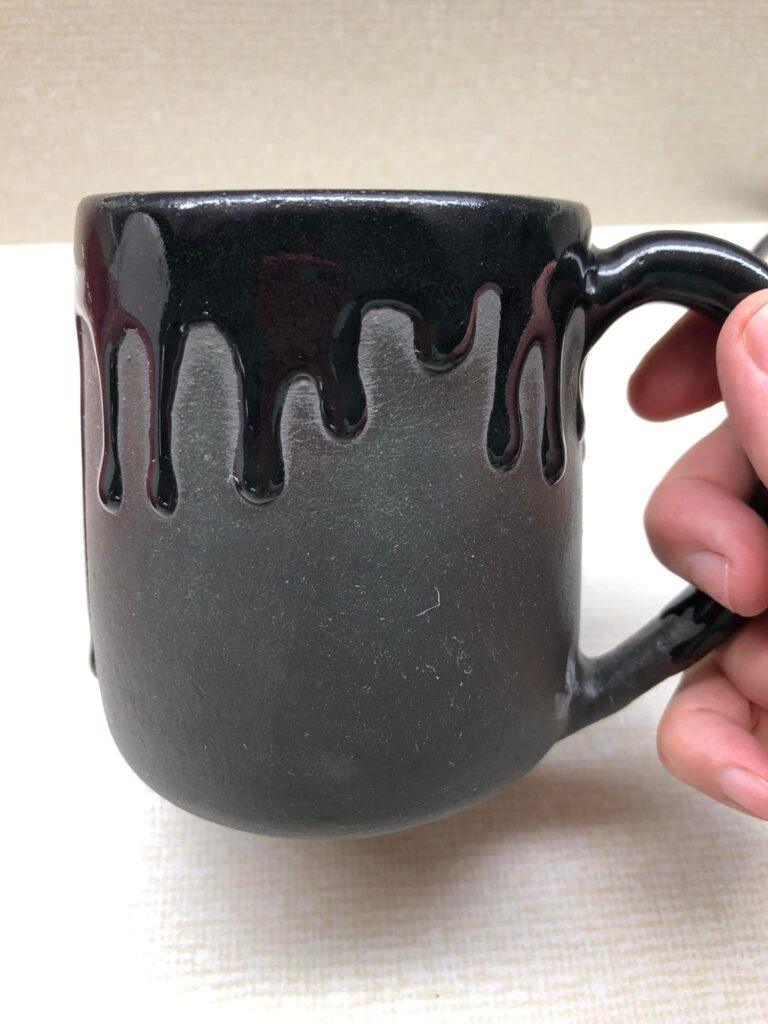 Black on black mug by Nancy de Carlo Snider