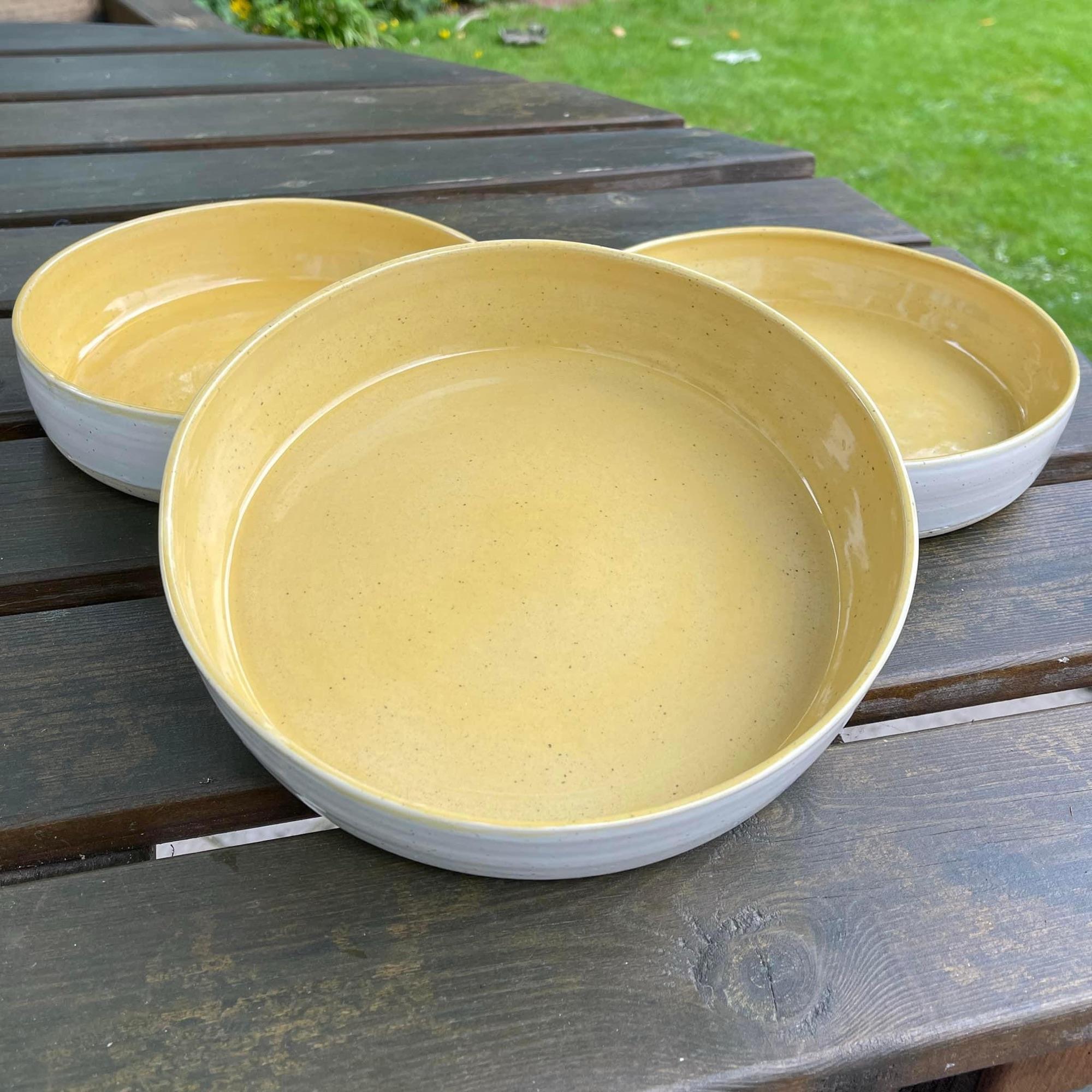 Yellow celadon pasta bowls by David Combes