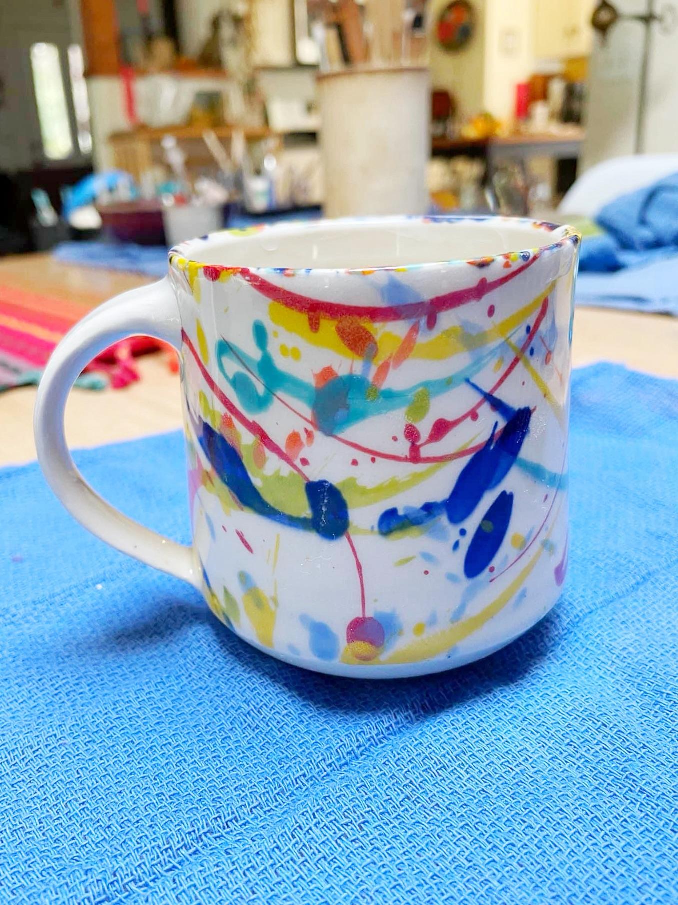 Rainbow confetti mug by Jen Hubbert