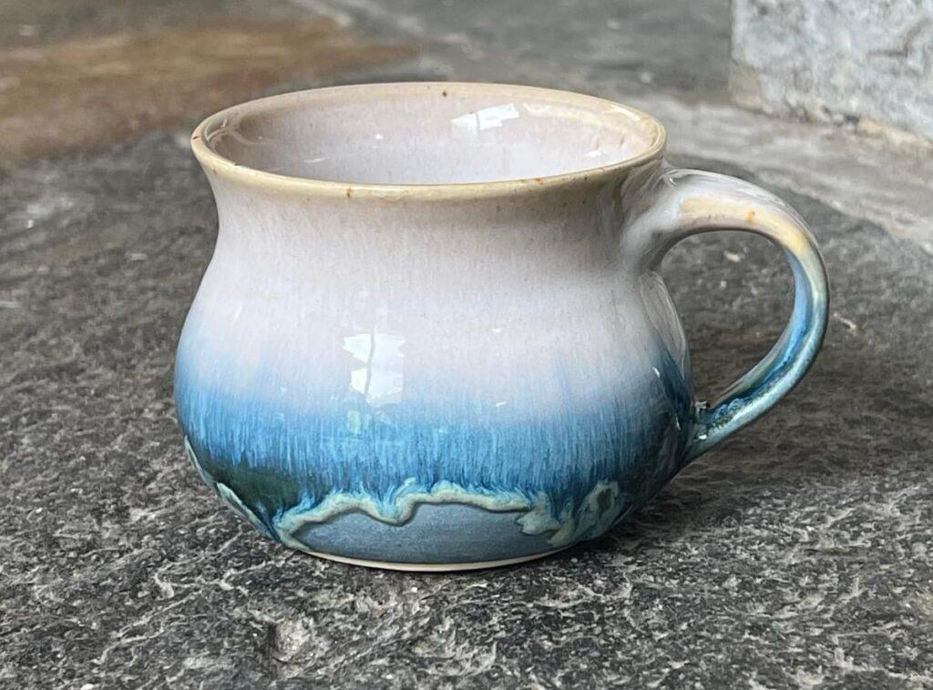 Soft white and Blue Oribe mug by Berkshire Potters