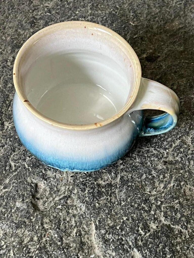 Soft white and Blue Oribe mug by Berkshire Potters