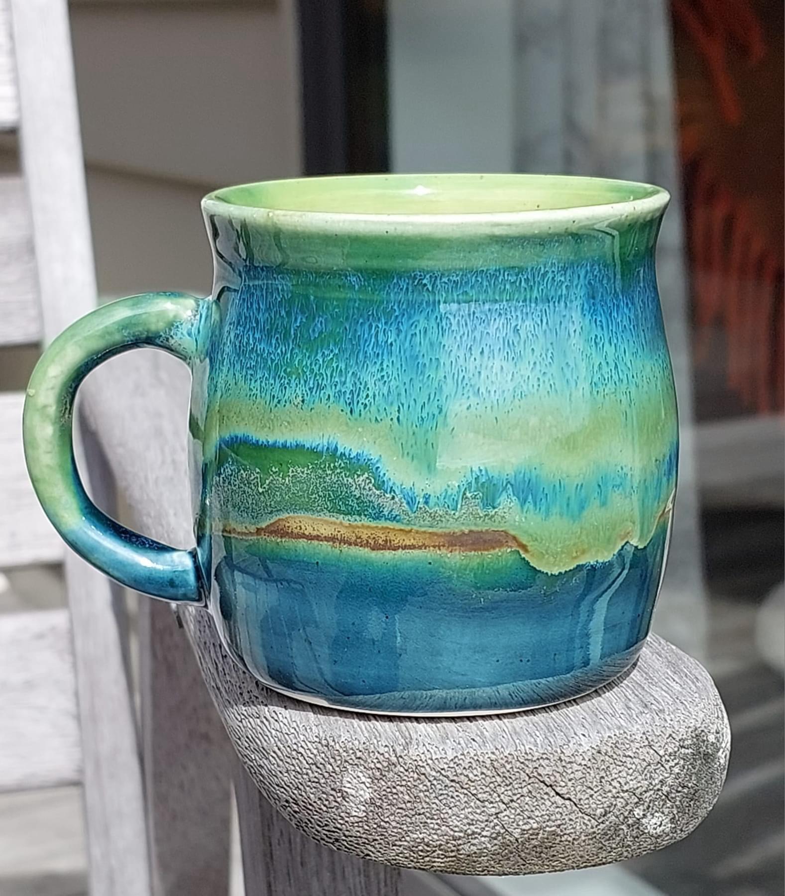 Blue-green striped Mug by Kathryn Hishon