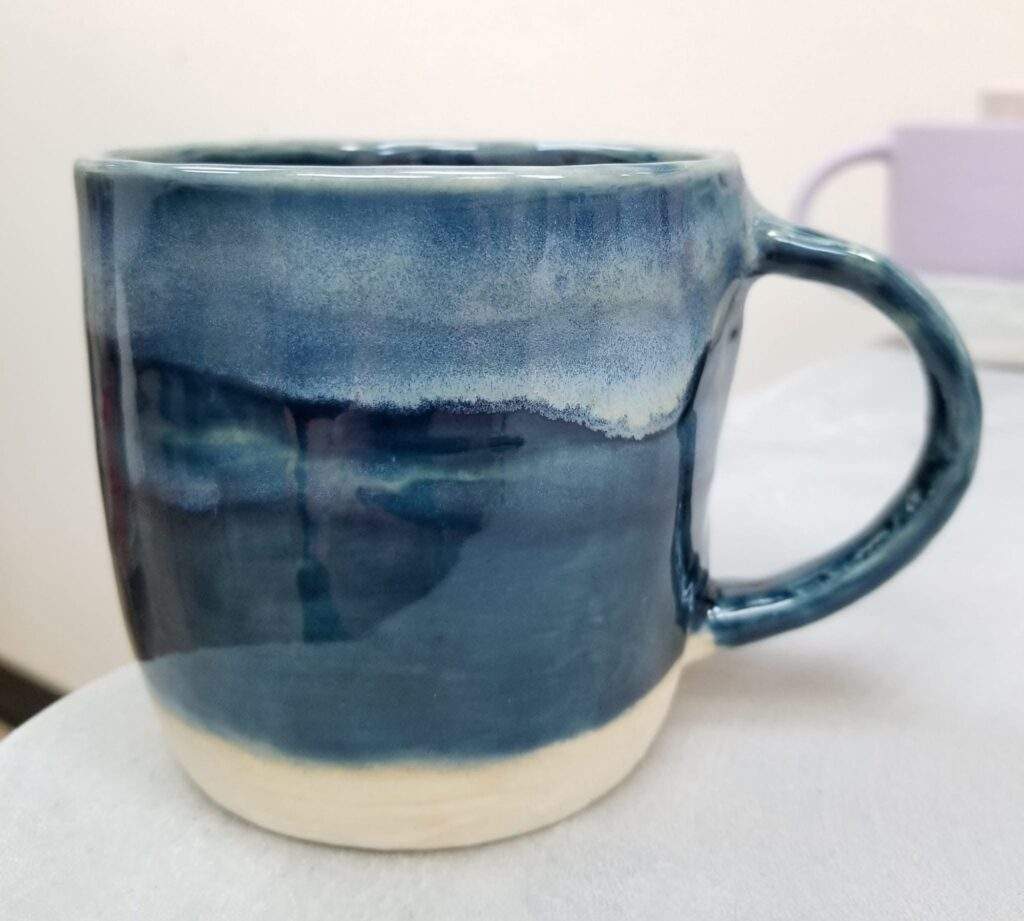 Dusky Mountain Skyline mug By Roxanne MacKay